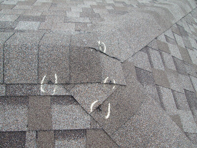 Hail damage on asphalt shingles